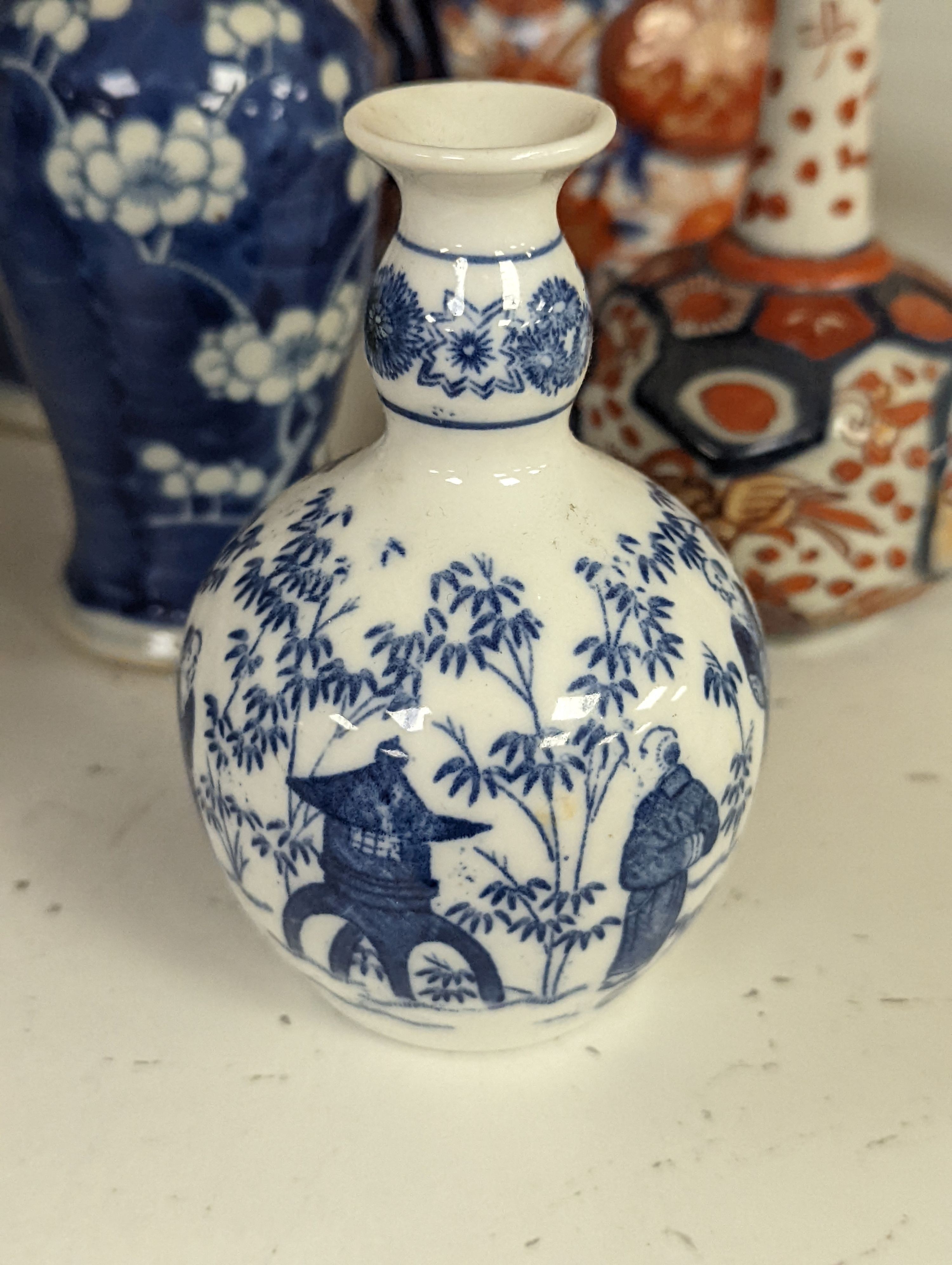 Assorted small Chinese blue and white vases etc., tallest 22cm